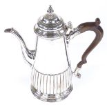 An Edwardian silver coffee pot, of tapered cylindrical half-fluted form, indistinct maker's marks,