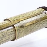 A Stanley Fuller slide rule calculator, showing scales of sines and logs, bakelite and brass case,