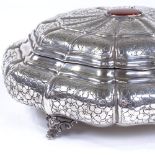 A Continental silver octagonal lidded box, with all over floral and foliate engraved decoration