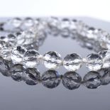 A faceted rock crystal bead necklace, bead diameter 12.4mm, necklace length 62cm, 101.4g