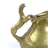 An Italian Grand Tour bronze jug, 18th or 19th century, with cast leopard handle and moulded