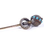 A Victorian unmarked gold and turquoise tie pin, settings test as 15ct, overall length 81.8mm, 2.5g