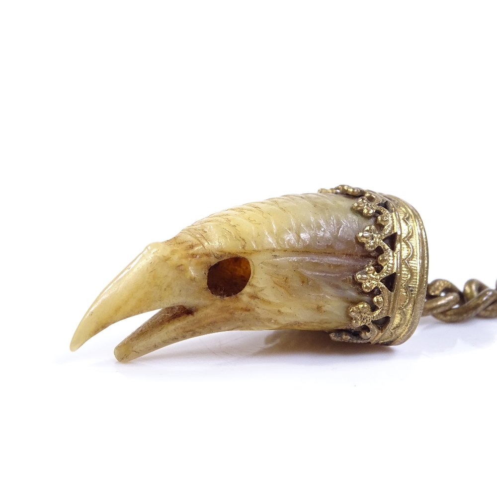 A Victorian carved horn and gilt-metal eagle head fob - Image 2 of 3