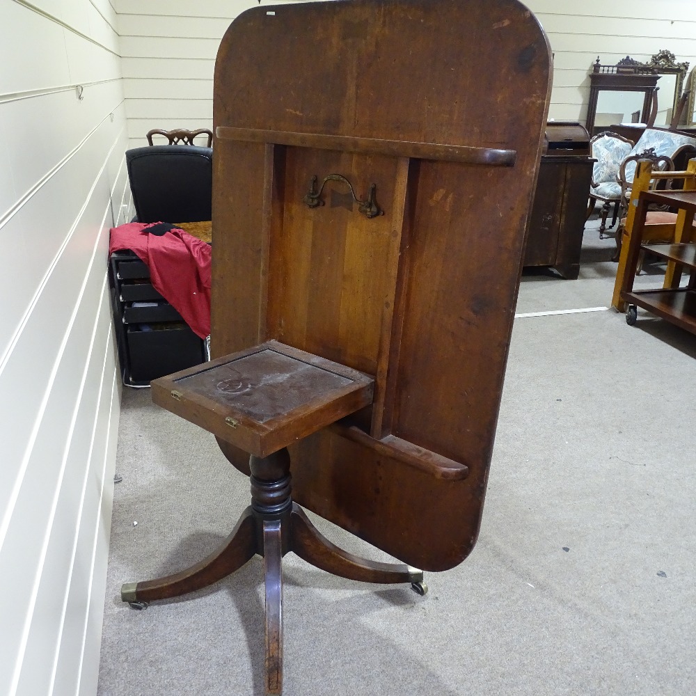 A 19th century mahogany tilt-top breakfast table, on quadruple splay leg base, 4'10" x 3'5" - Image 2 of 4