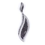 An 18ct white gold black and white diamond cluster leaf pendant, total black diamond content