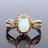An 8ct gold opal panel ring, with rope twist surround, setting height 12.2mm, size S, 1.9g