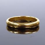 A 22ct gold wedding band ring, maker's marks HA, hallmarks Birmingham 1925, band width 3.4mm, size