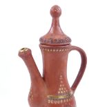 A Turkish gilded terracotta coffee pot and cover, height 30cm