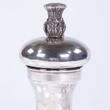 A small silver pepper grinder, with cast-silver thistle finial, maker's marks BD, hallmarks