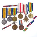 A collection of First and Second War Service medals, including a trio awarded to G-1502 Pte R Wood