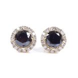 A pair of 14ct gold 2.96ct black and white diamond cluster earrings, with stud fittings, total black