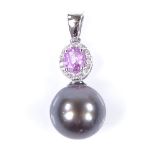 A 14ct white gold Tahitian pearl pink sapphire and diamond cluster pendant, oval-cut sapphire approx