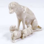 A Victorian ivory carving, depicting a dog and puppies, height 3.5cm