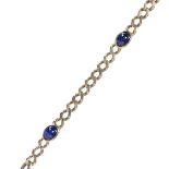 A 9ct gold cabochon sapphire curb link bracelet, each sapphire approx 0.7ct, total sapphire weight