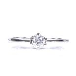 A 9ct white gold 0.25ct solitaire diamond ring, size O, 2.4g