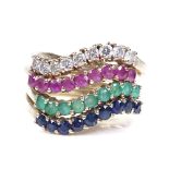 A set of 4 9ct gold emerald ruby sapphire and diamond half-hoop stacking rings, total setting height