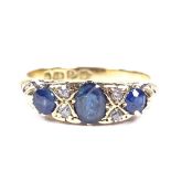 An 18ct gold 7-stone sapphire and diamond half-hoop ring, hallmarks Chester 1907, setting height