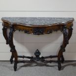 A 19th century French walnut and marble-top console table, with shaped front, carved frieze and