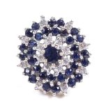 A 9ct gold sapphire and diamond cluster cocktail ring, setting height 20.5mm, size O, 5.3g