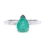 A 14ct white gold solitaire emerald ring, with diamond set shoulders, pear-cut emerald approx 1.