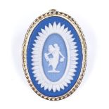 A Wedgwood Jasperware oval panel pendant/brooch, in unmarked 9ct gold frame, brooch height 26.4mm,