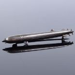 A Second War Period silver torpedo design brooch, maker's marks FHM, hallmarks Birmingham 1942,