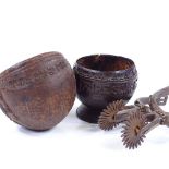 2 relief carved coconut cups, 1 dated 1890, and a pair of Gaucho spurs