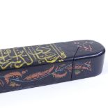 An Islamic gilded and lacquered pen box, length 32cm