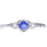 A 14ct white gold tanzanite and diamond bracelet, cushion-cut tanzanite approx 5.05ct, total