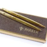 A Parker gold plated ballpoint pen and propelling pencil set, new and unused condition, boxed