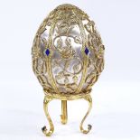 A Theo Faberge style St Petersburg Collection Egg - Emergence of Spring, silver and enamel egg,