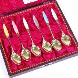 A set of 6 Danish sterling silver-gilt and coloured enamel coffee spoons, with engine turned