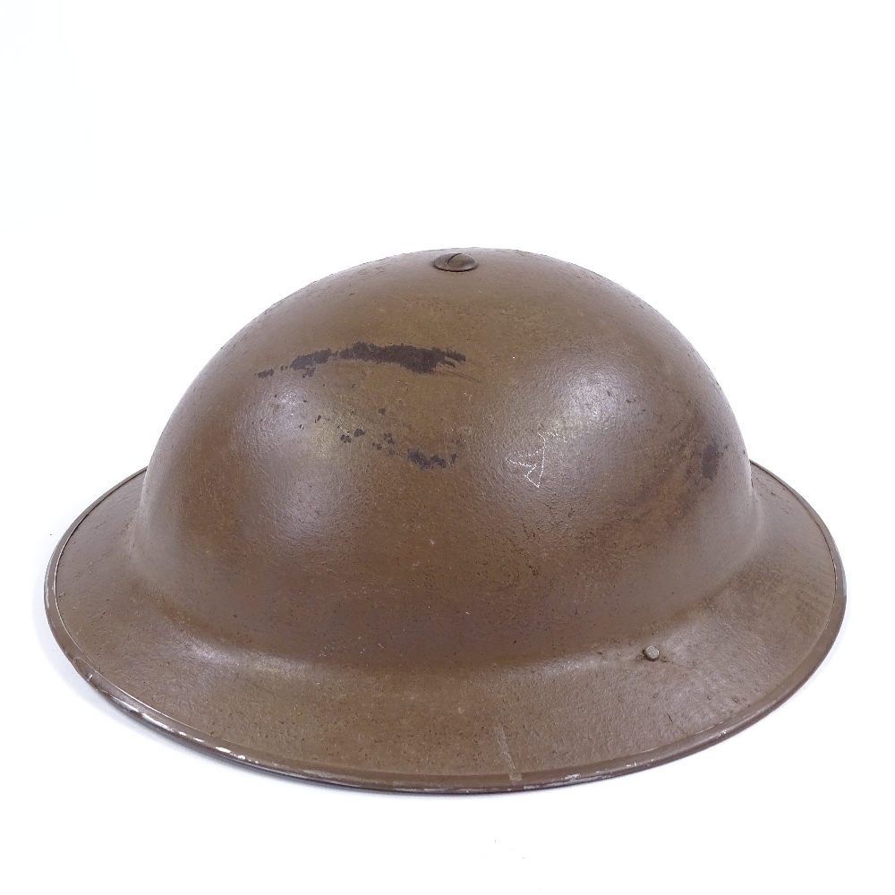 A Second War Period British Army tin helmet dated 1938 - Image 2 of 3