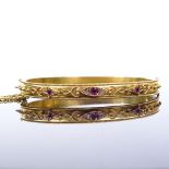 A Victorian unmarked gold ruby and rose-cut diamond hinged bangle, with bead and rope twist