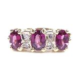 An 18ct gold 7-stone tourmaline and diamond half-hoop ring, maker's marks AC.Co, hallmarks London