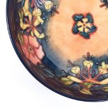 Moorcroft Pottery Wild Rose and Honeysuckle pattern fruit bowl, 1993, 26cm across