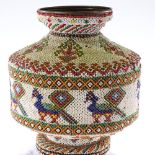 A large South American 4-section brass vase, with applied coloured bead work decoration, height 91cm
