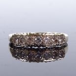A 9ct gold 7-stone diamond half-hoop ring, total diamond content approx 0.5ct, setting height 5.4mm,