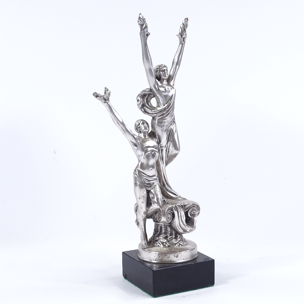 A silver patinated bronze Classical sculpture depicting 2 figures holding laurel wreaths, on - Image 2 of 3