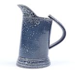 Walter Keeler (British born 1942), a blue salt glaze leaning jug, height 17cm
