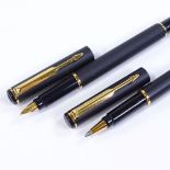 A Parker Rialto matte black/gold trim fountain pen and ballpoint pen, new and boxed