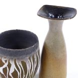 John Wheeldon (British born 1950), a Raku Studio pottery vase with painted design, height 16cm (