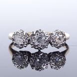 An 18ct gold 3-stone diamond ring, total diamond content approx 0.17ct, setting height 6.1mm, size