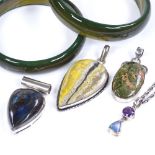 Various silver and hardstone pendants, and 2 green stone bangles