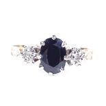 A 9ct gold 3-stone sapphire and diamond ring, setting height 7.9mm, size M, 1.7g