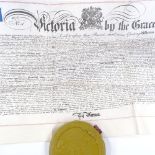 An 1876 vellum indenture with large Victoria wax seal attached, in metal case