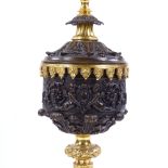 A modern patinated and parcel gilt-bronze table lamp, with relief moulded Classical designs,