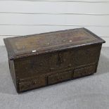 An 18th century brass-studded Zanzibar chest with drawers under, width 3'10"