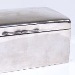 A rectangular silver cigarette box, with interior gilt lid, by A&J Zimmerman Ltd, hallmarks