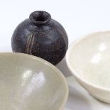 2 Chinese ceramic bowls, largest 12cm across, and a Chinese black glaze gourd (3)